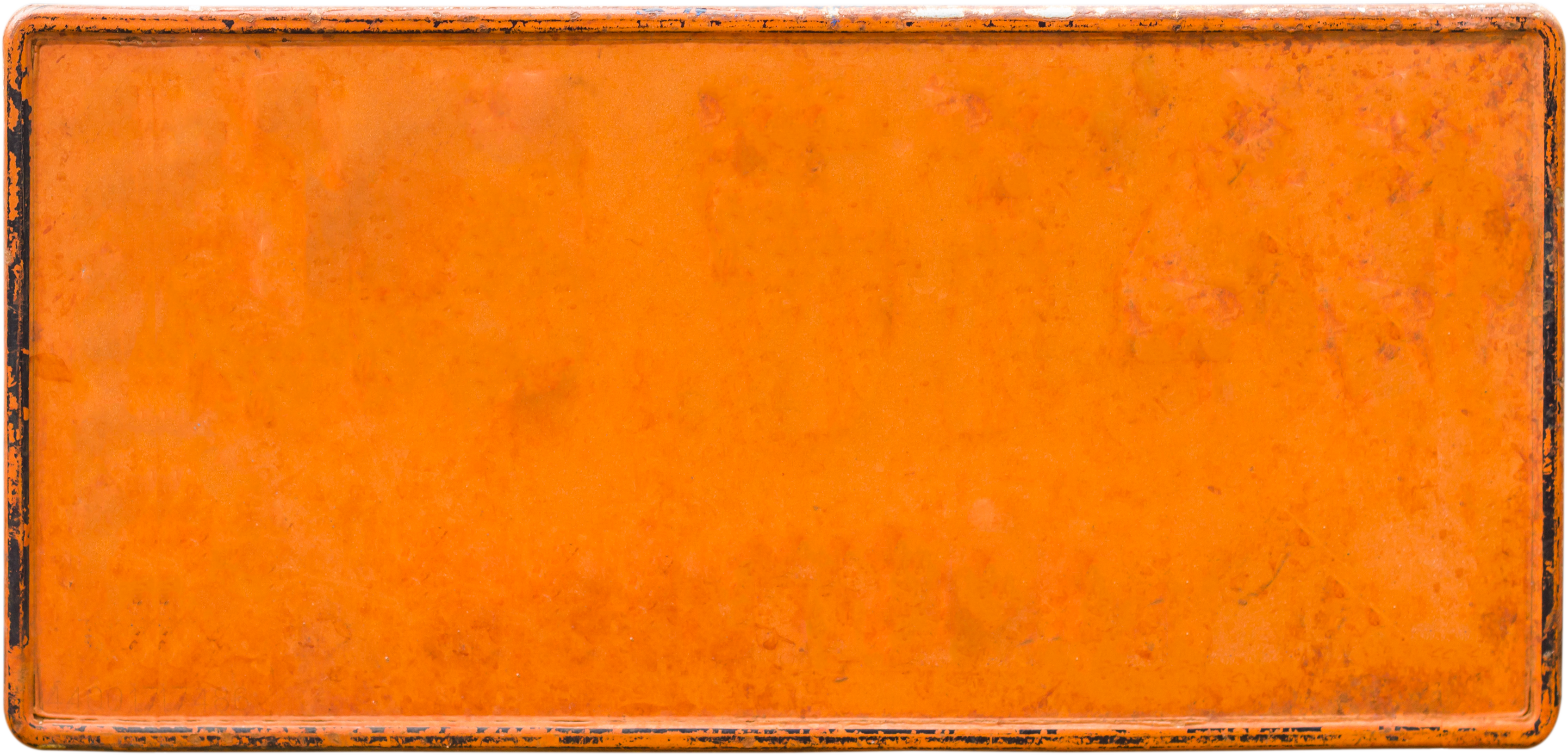 old orange vehicle license plate with copy space